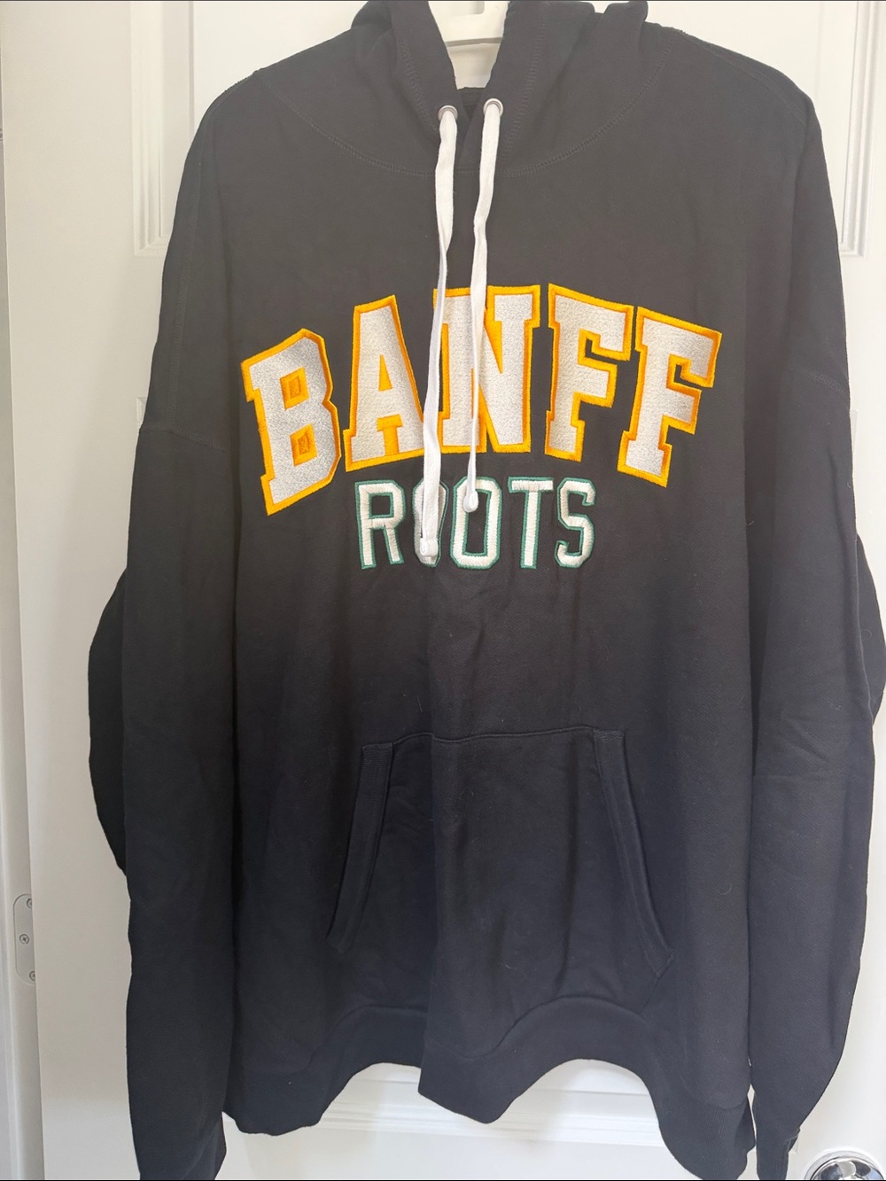 Roots Black 'BANFF' Pullover Hoodie with Yellow and Green Lettering